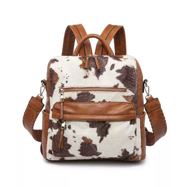 Amelia Convertible Backpack With Guitar Strap In Cow-Brown by Jen & Co.